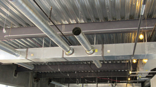 Galvanized spiral duct on commercial ceiling