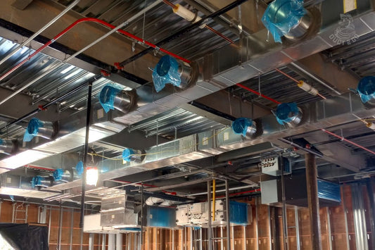 Installed ductwork from ceiling by Duct2Go