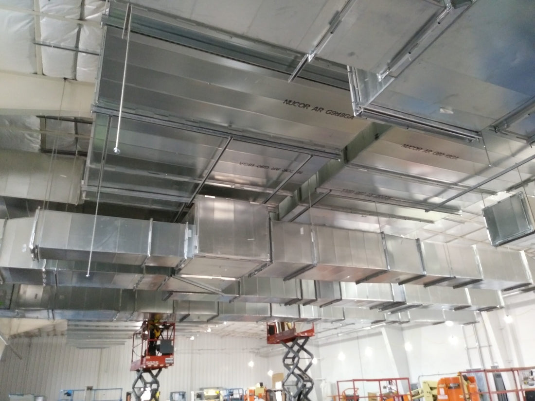 HVAC ductwork installed overhead on a commercial ceiling